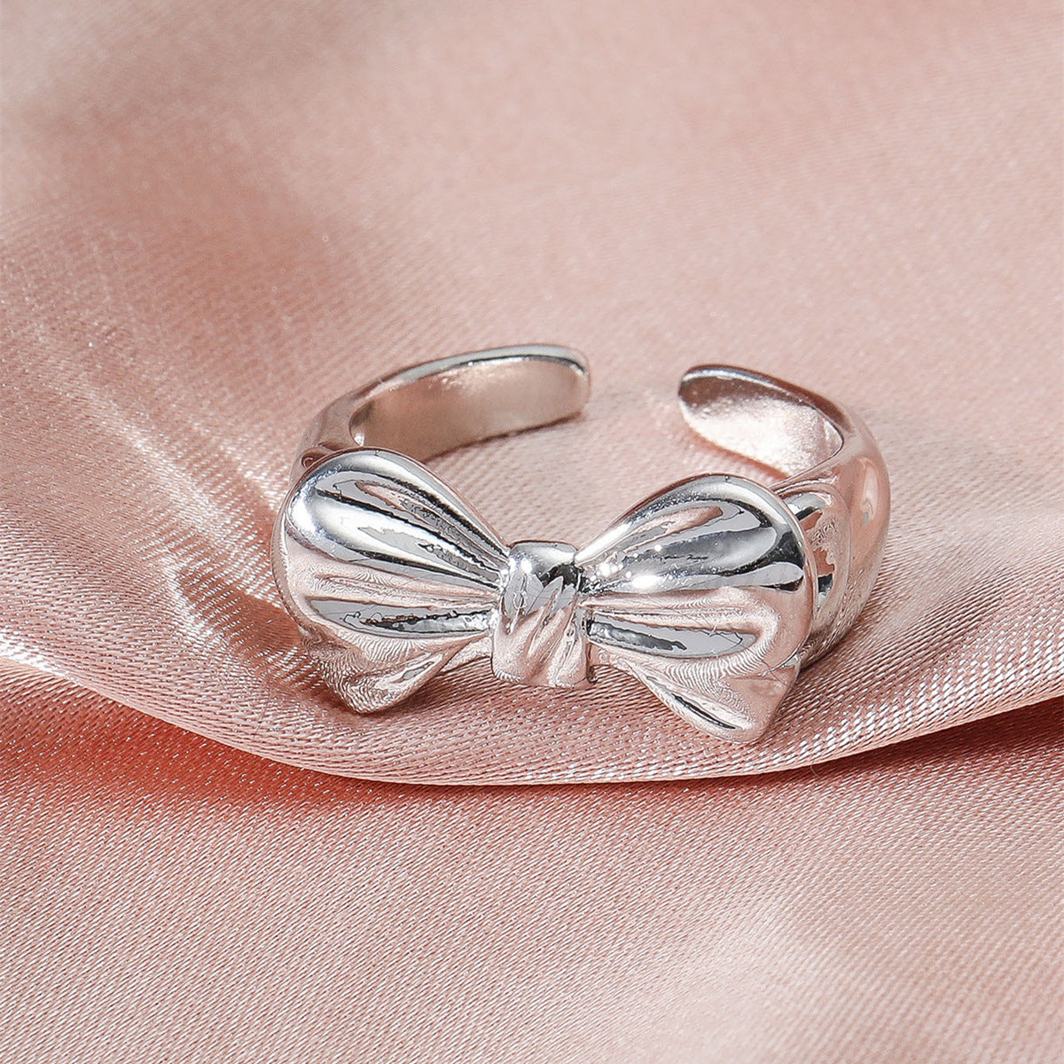 Anello fiocco aperto placcato oro