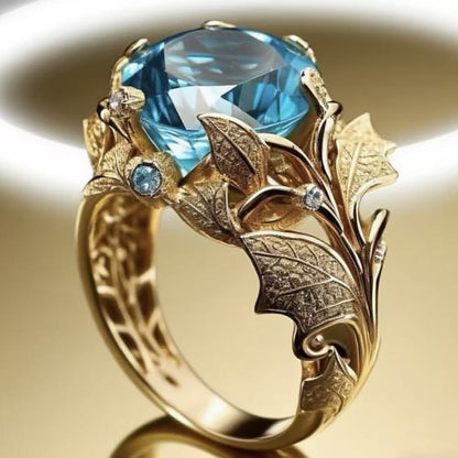 Anello placcato oro pietra blu