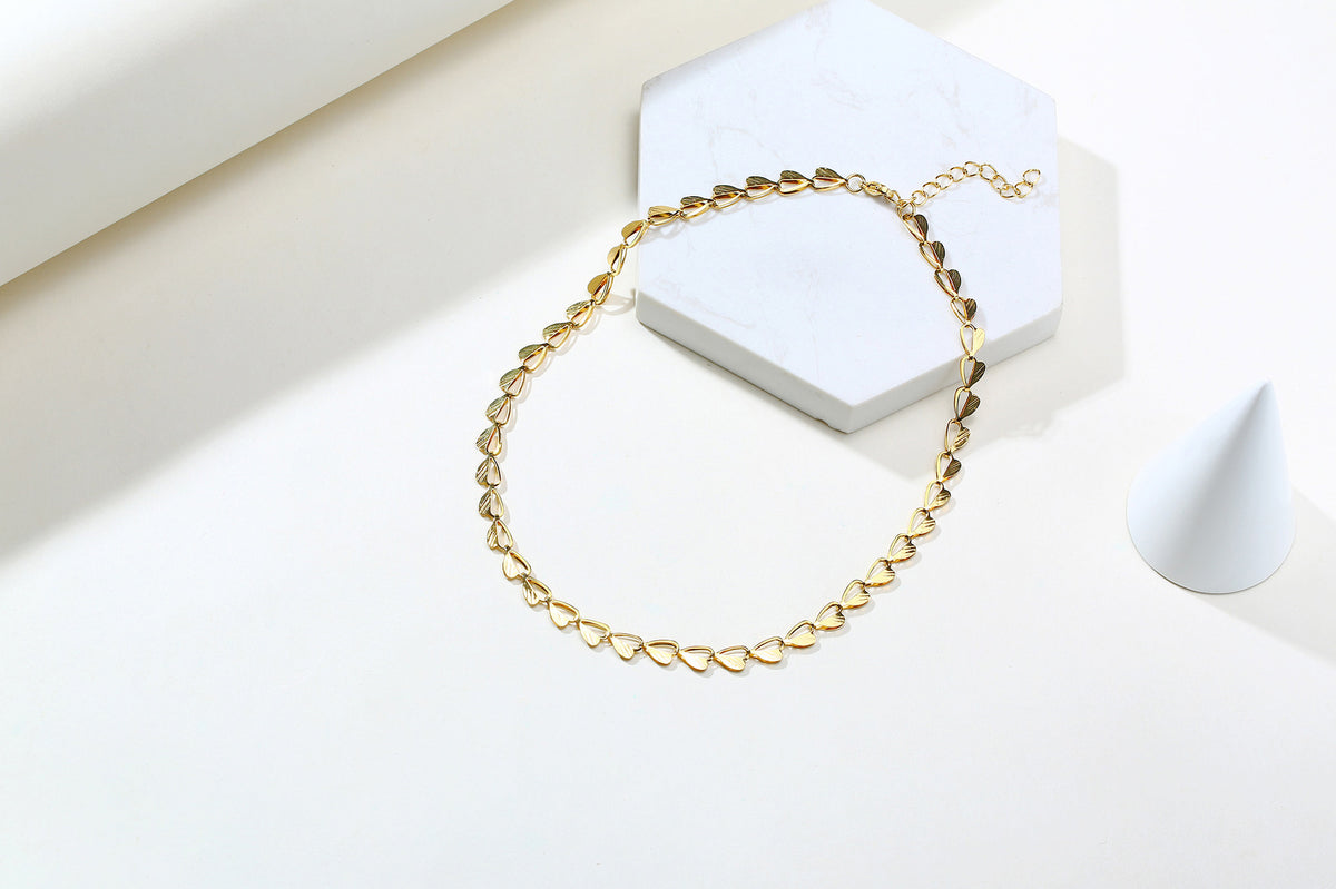 Collana foglia titanio