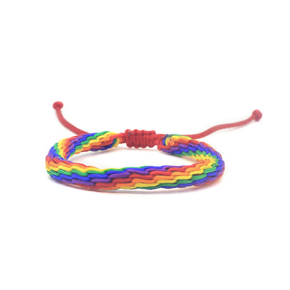 Bracciale intrecciato arcobaleno da mano