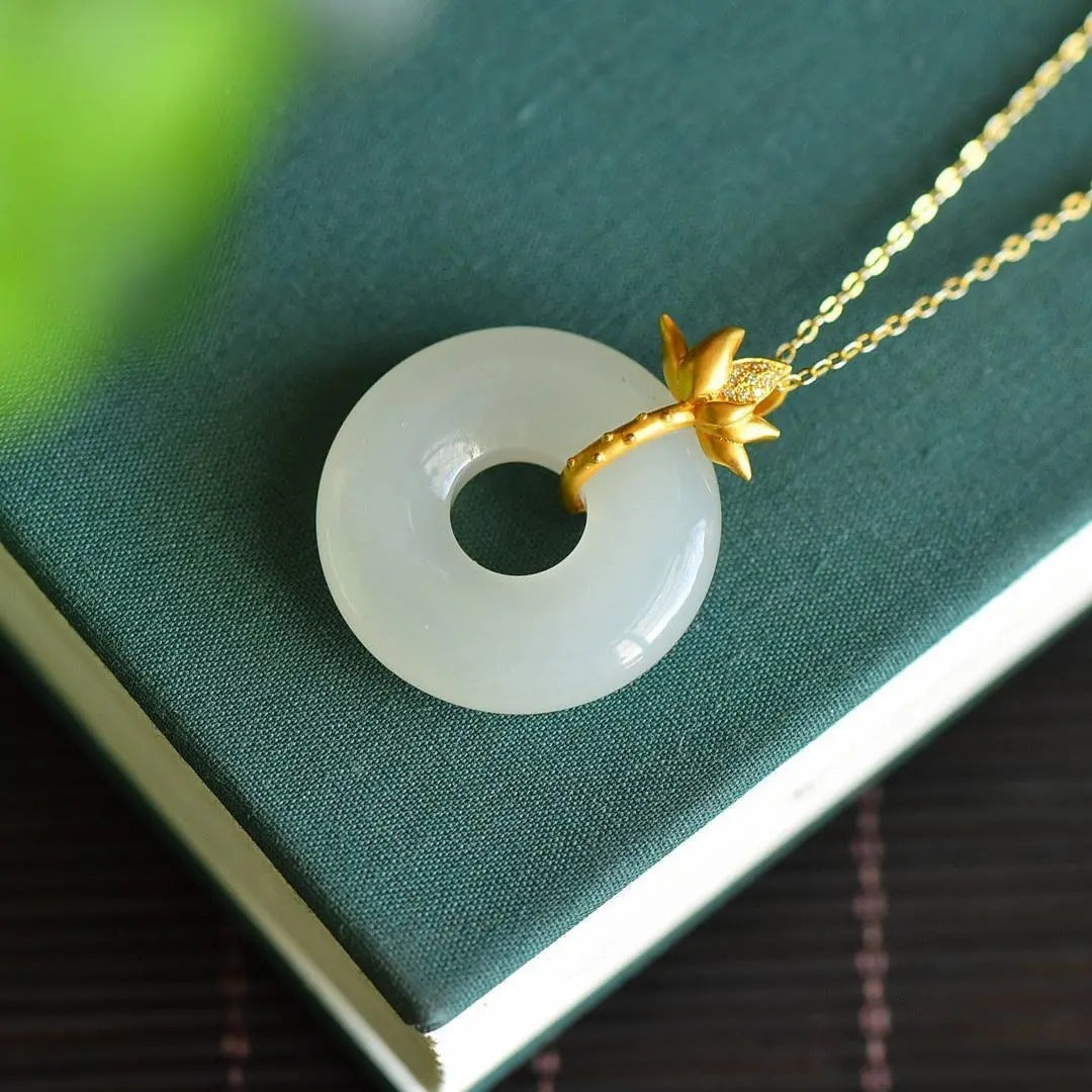 Collana pendente fiore di loto dorato