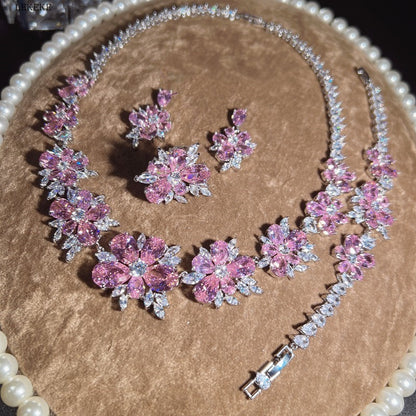 Set gioielli fiore con diamanti