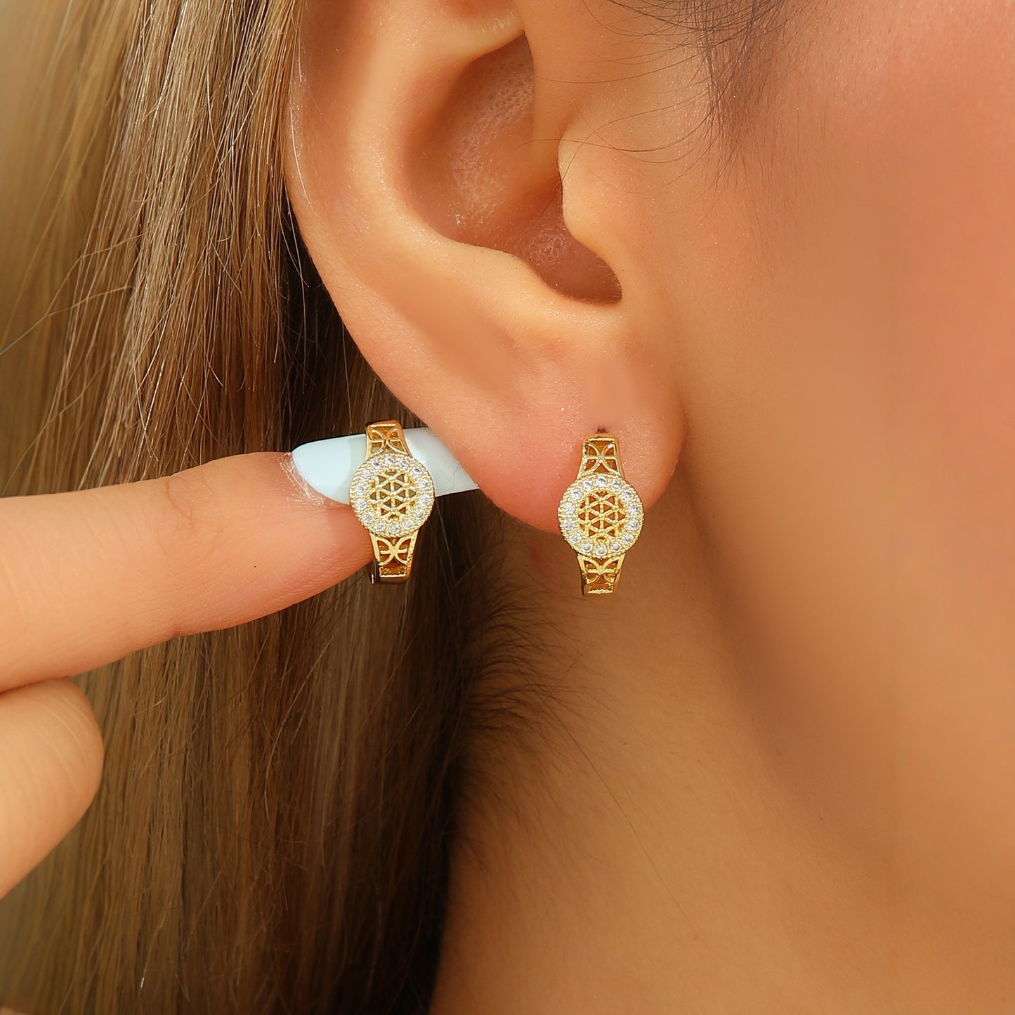 Orecchini zircone traforati