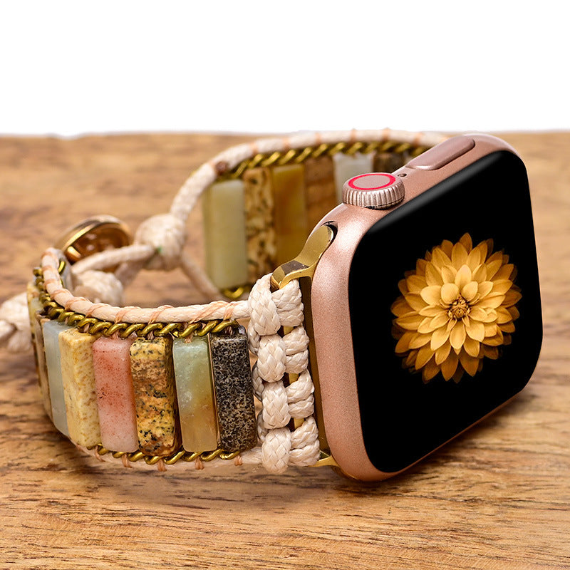 Orologio con cinturino intrecciato pietre