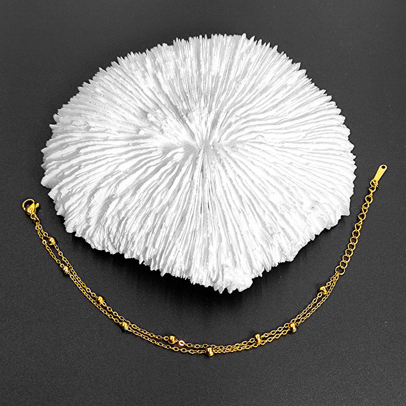 Bracciale doppio strato dorato