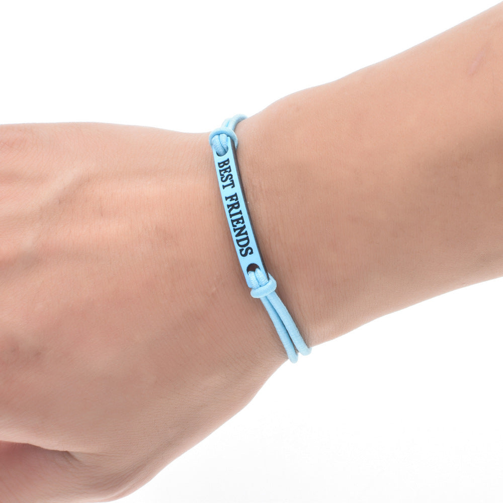 Set bracciali elastici con ciondoli