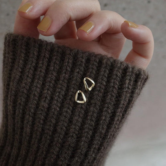 Orecchini triangolari in argento e oro