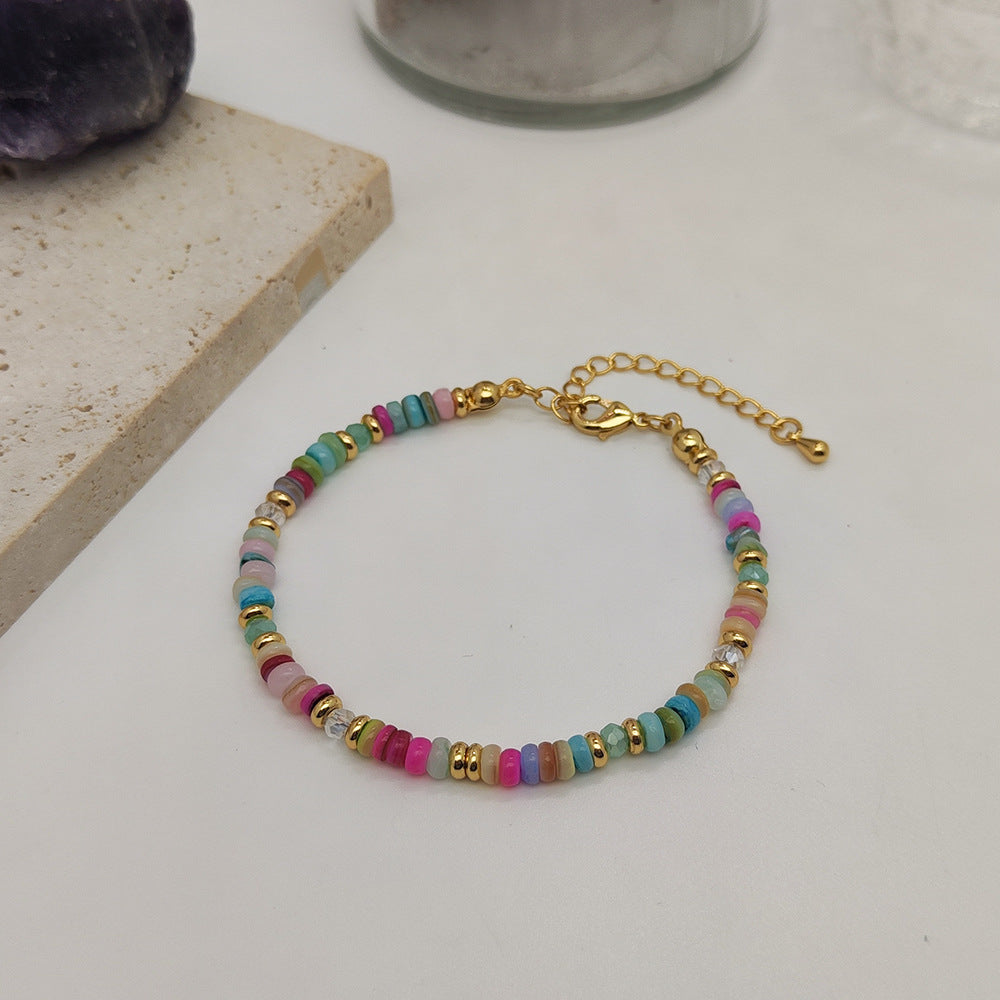 Bracciale conchiglia tessuto