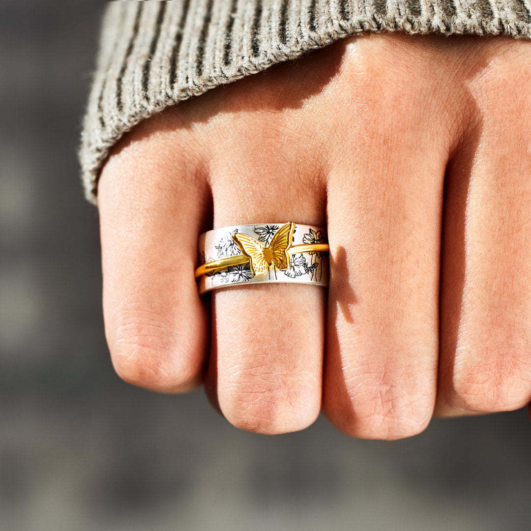 Anello farfalla rotante