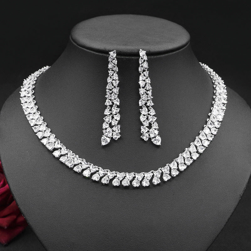 Set catena clavicolare e orecchini zircone