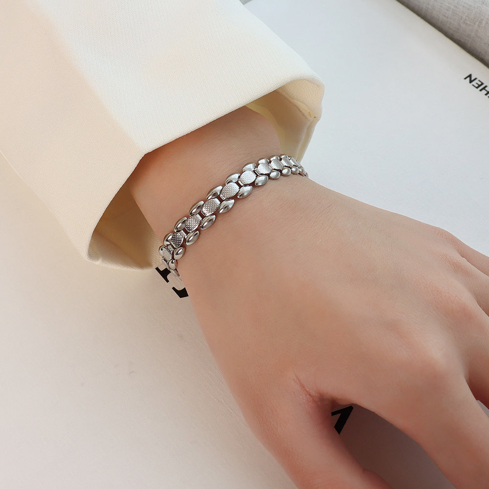 Bracciale titanio oro 18K