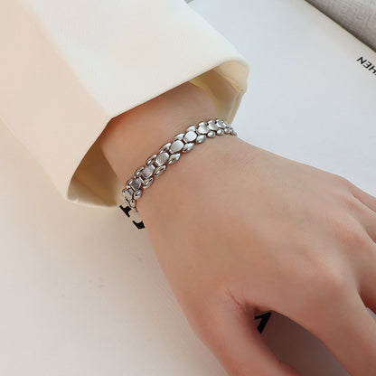 Bracciale titanio oro 18K