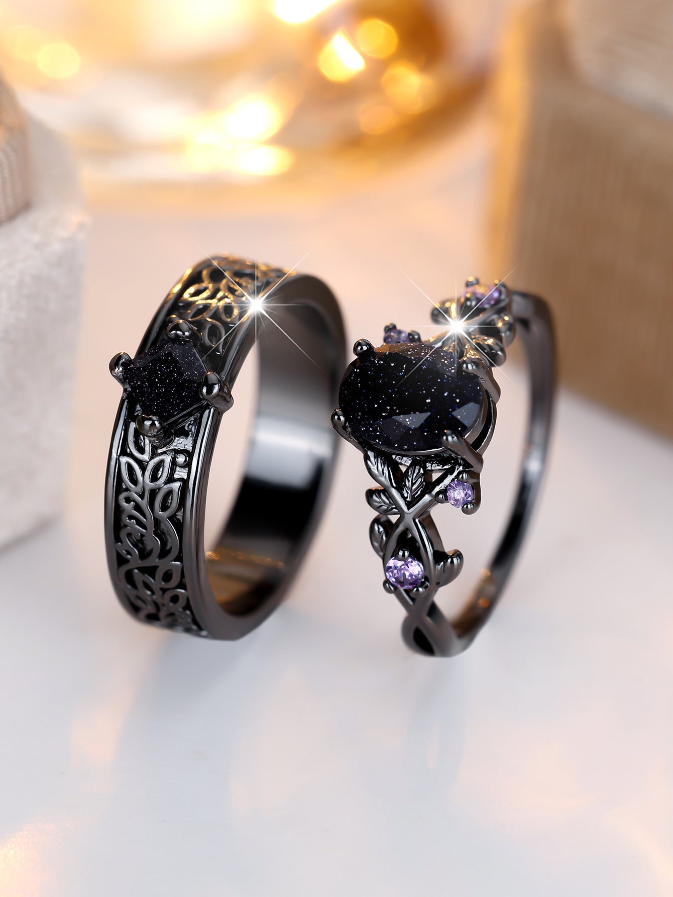 Anello uovo oro nero cristalli blu