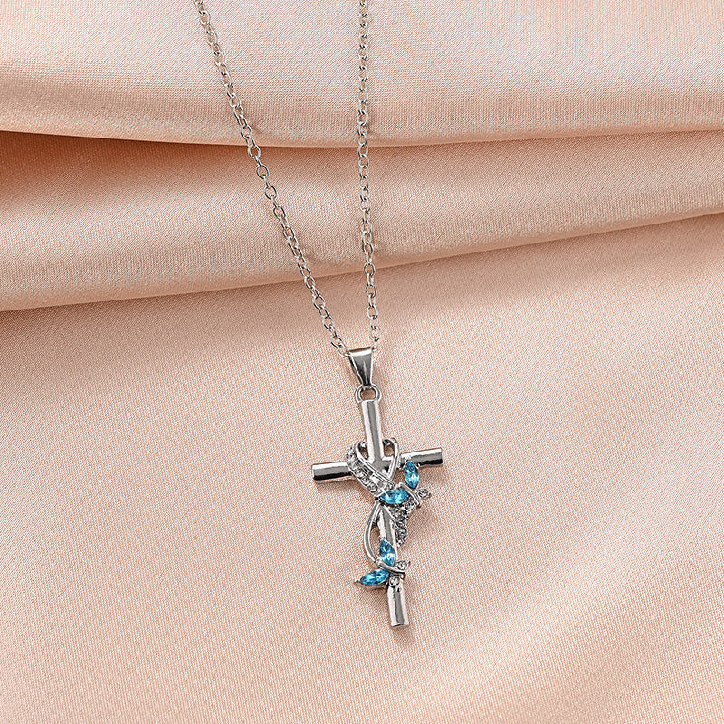 Collana farfalla croce