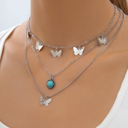 Collana etnica con farfalla turchese