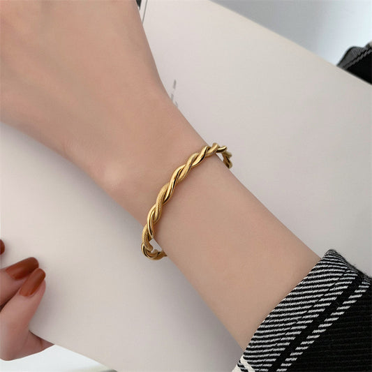 Bracciale titanio placcato oro geometrico