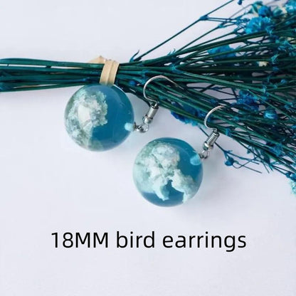 Orecchini sfera trasparente stile Mori