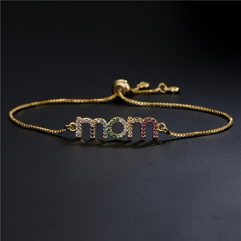 Braccialetto charm mamma oro