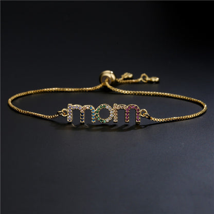 Braccialetto charm mamma oro
