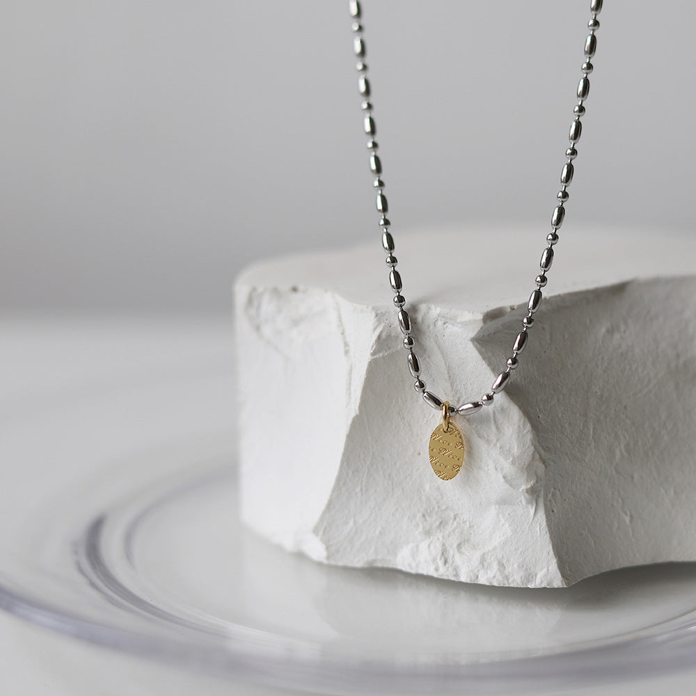 Collana lettere geometrica
