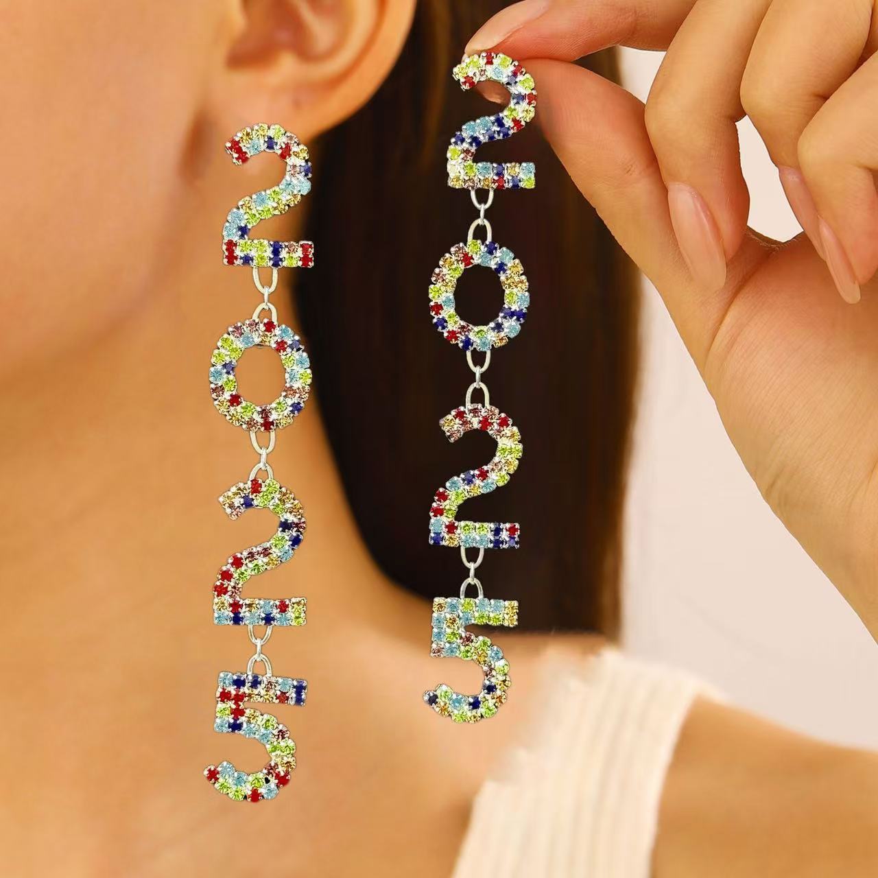 Orecchini Geometrici con strass e nappa