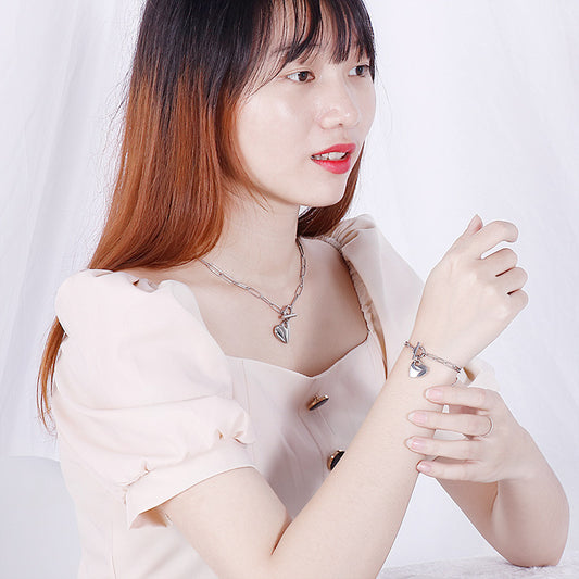 Set collana braccialetto titanio