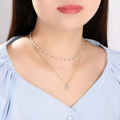 Collana anello doppia perla