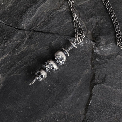 Collana teschio e spada