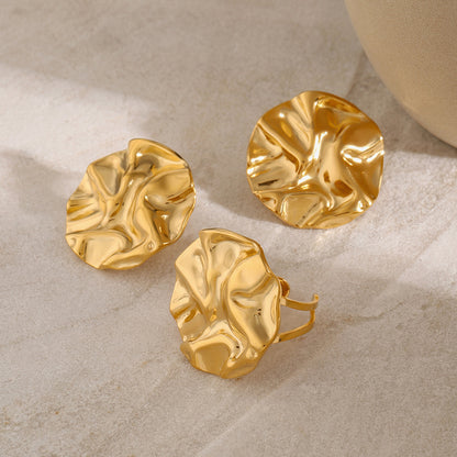 Orecchini rotondi martellati oro