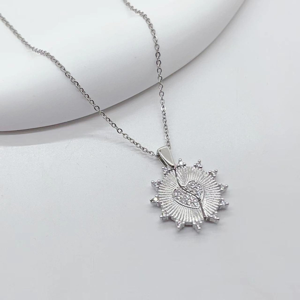 Collana acciaio titanio cuore farfalla girasole