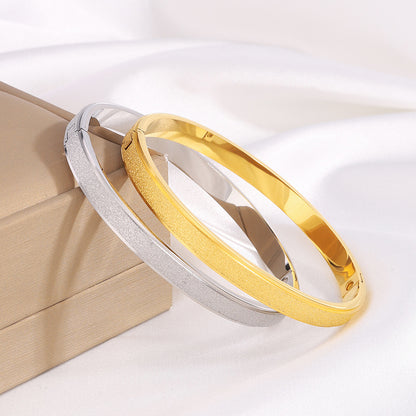Braccialetto titanio stelle oro