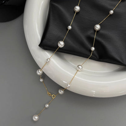 Collana lunga con perle