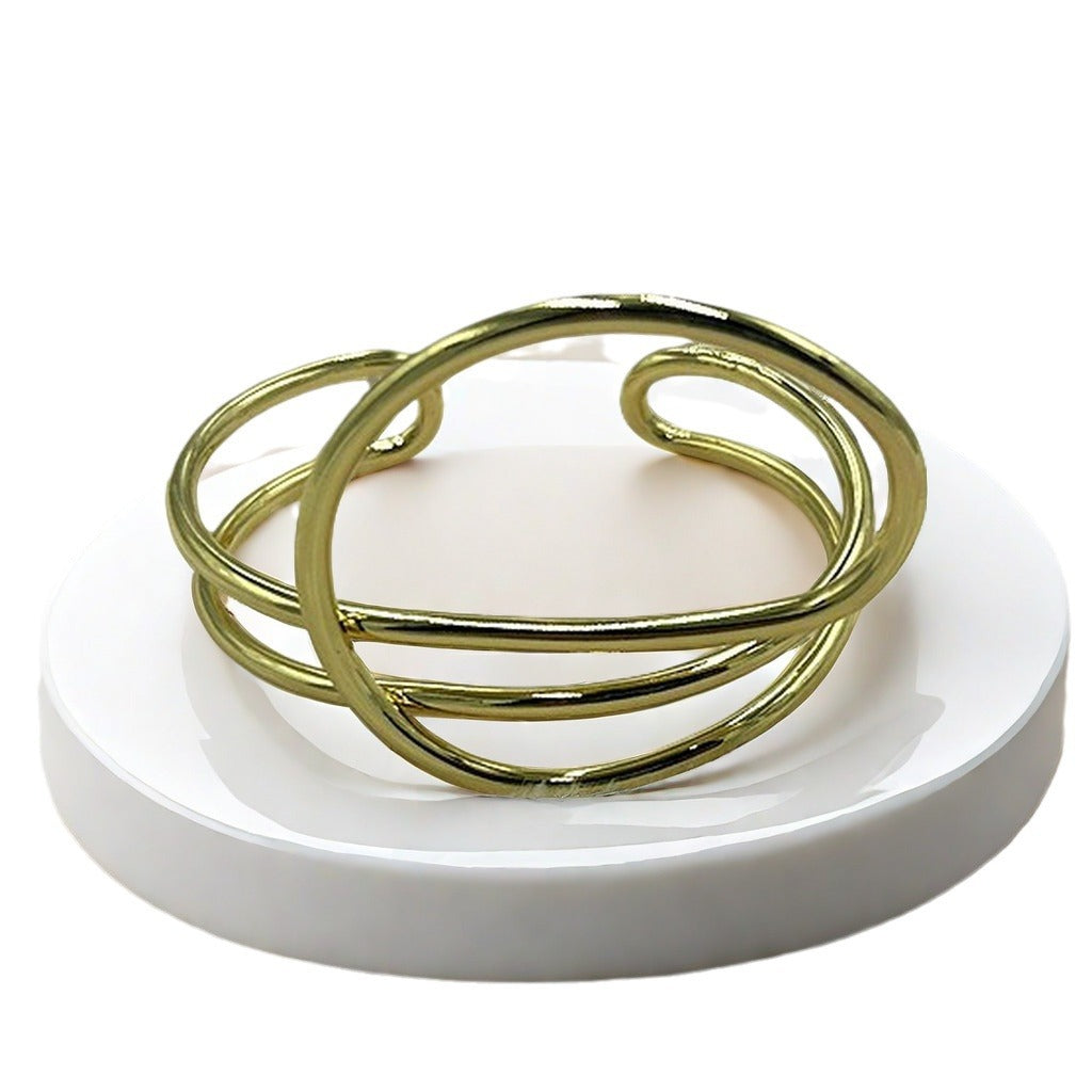 Bracciale geometrico regolabile
