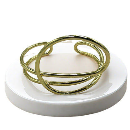Bracciale geometrico regolabile