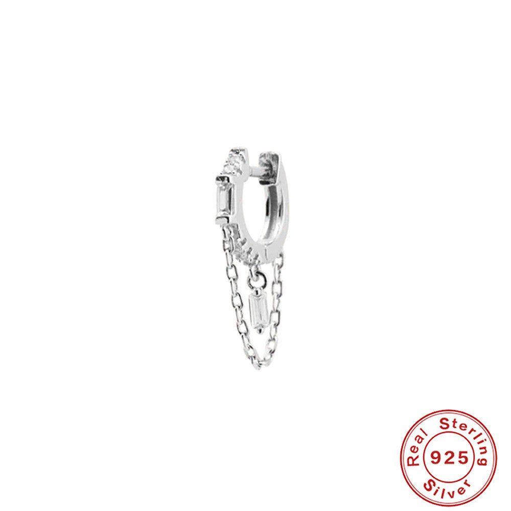 Orecchini geometrici zircone con nappina
