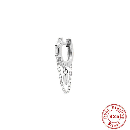 Orecchini geometrici zircone con nappina