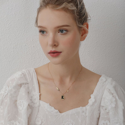 Collana stella luna smalto nero