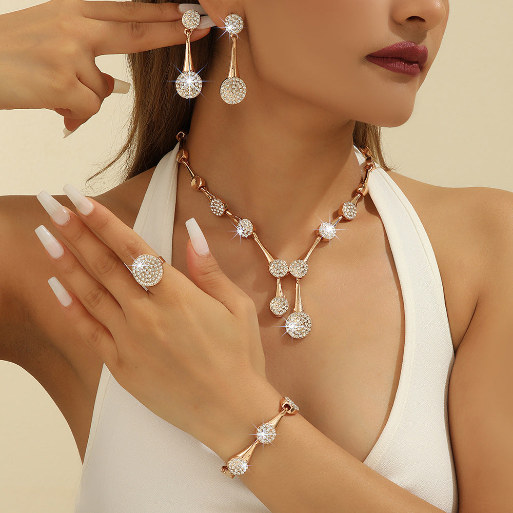 Collana e orecchini cristalli oro