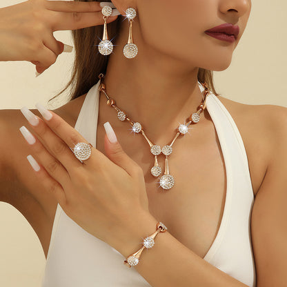 Collana e orecchini cristalli oro