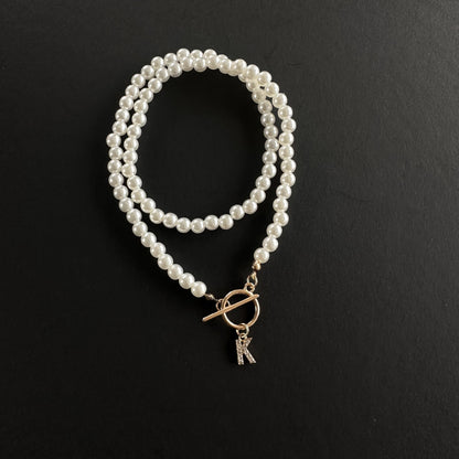 Collana perle con lettere