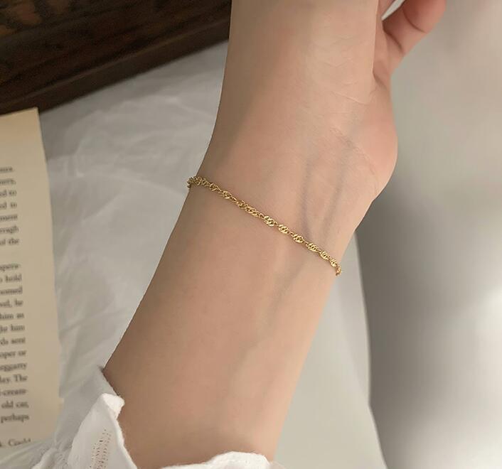 Bracciale titanio placcato oro a spira