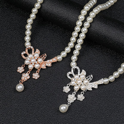Collana e orecchini perle floreali