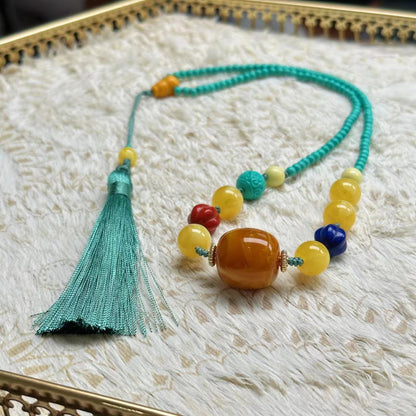 Collana turchese con ciondolo portafortuna