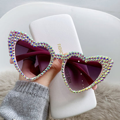 Occhiali da sole cat-eye da donna con cuore