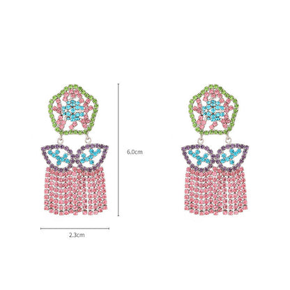 Orecchini geometrici con nappe