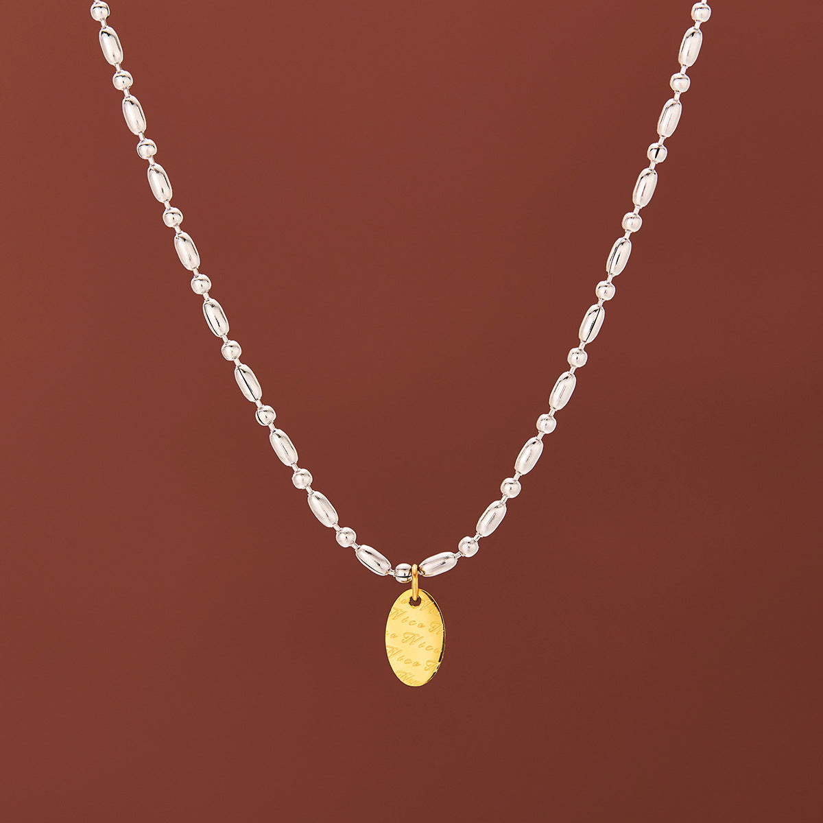 Collana lettere geometrica