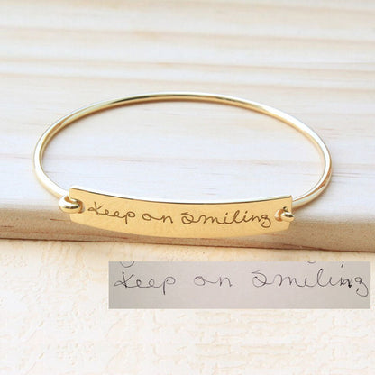 Bracciale con iniziale incisa