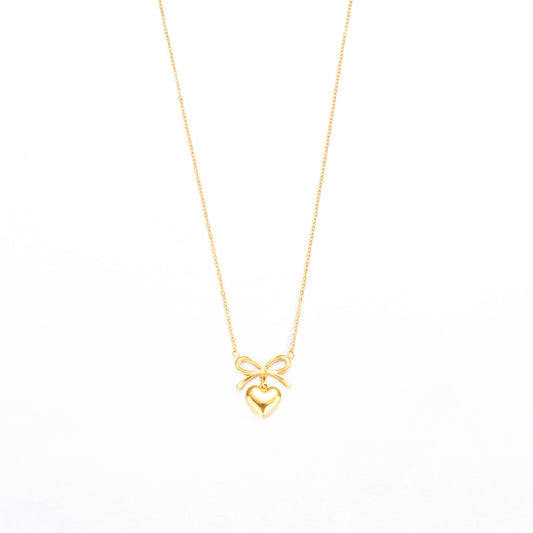 Collana charm cuore e fiocco