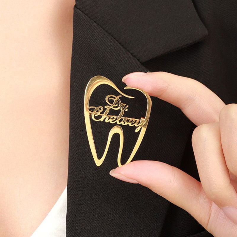 Spilla dente in acciaio inox