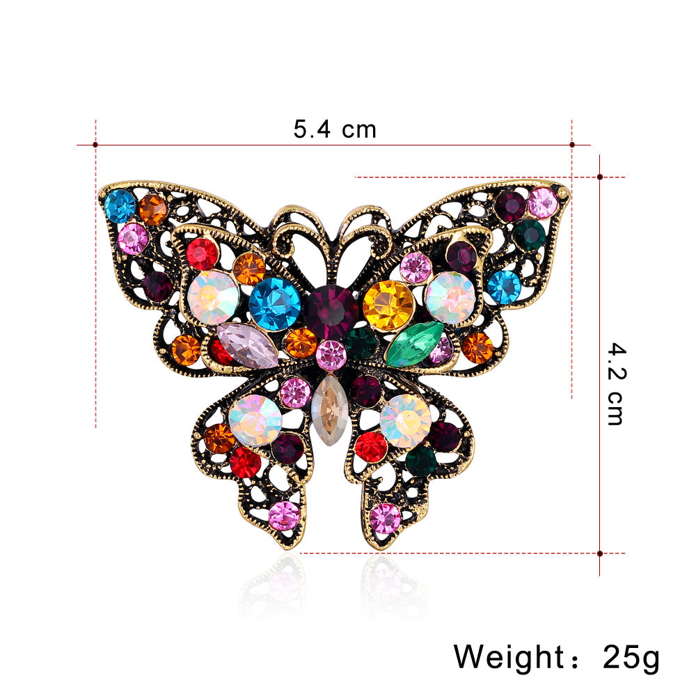 Spilla farfalla strass colorata